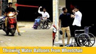 Throwing Water Balloons From Wheelchair | Throwing Water Balloons Prank | Prakash Peswani Prank |