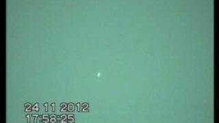 Multiple UFO sightings over Sydney.&large Bullet shape UFO captured.24.11.2012.Make comment&rate.